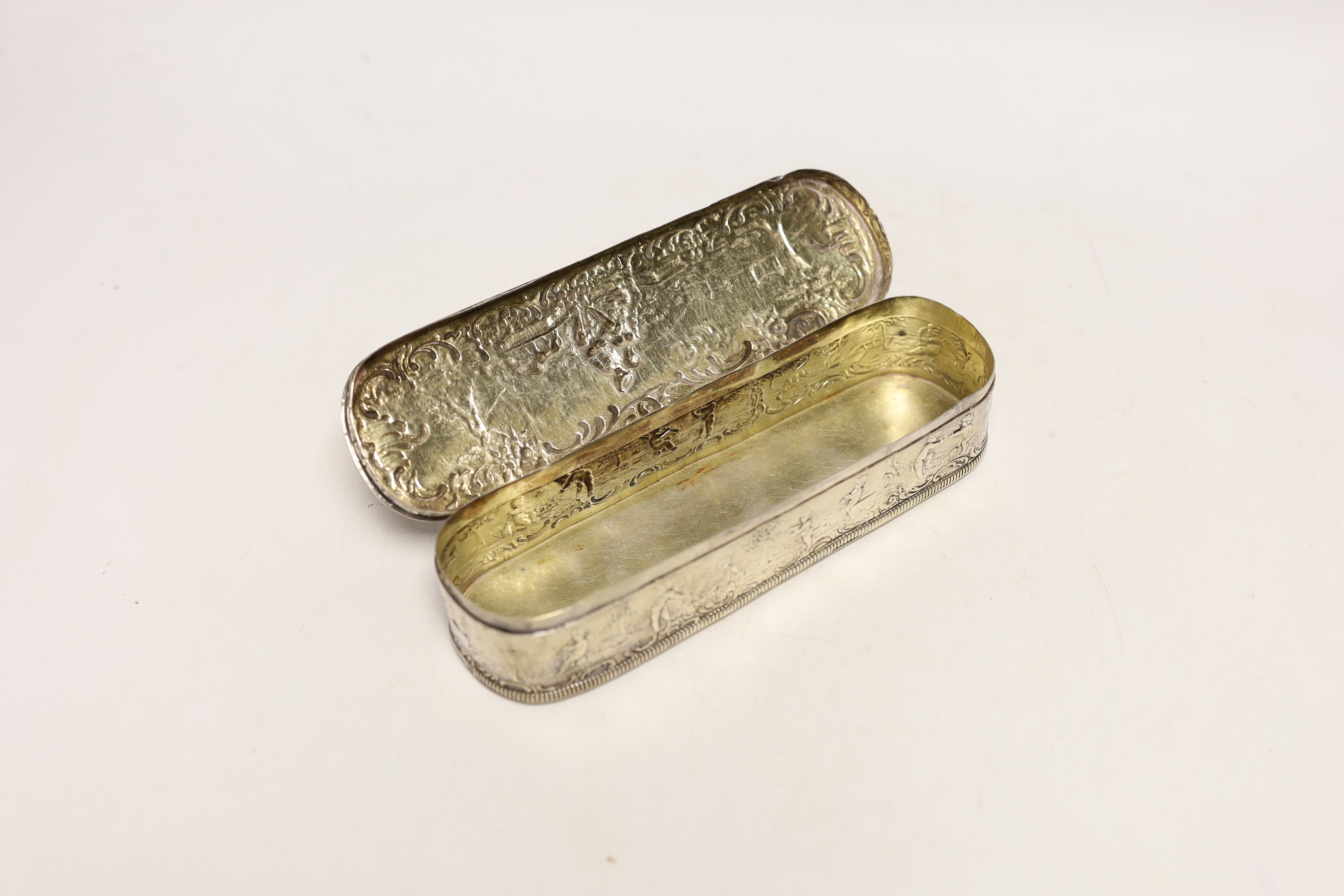 A late 19th/early 20th century Hanau repousse white metal oval box, with hinged cover, 18cm, 7.2oz.